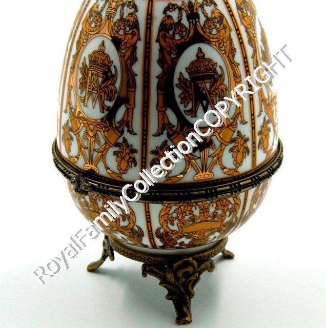 Large porcelain decorative egg - white and gold colour faberge style