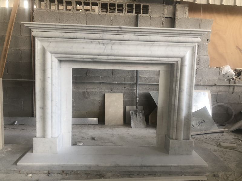 Carrara white marble fireplace surround with bolection style