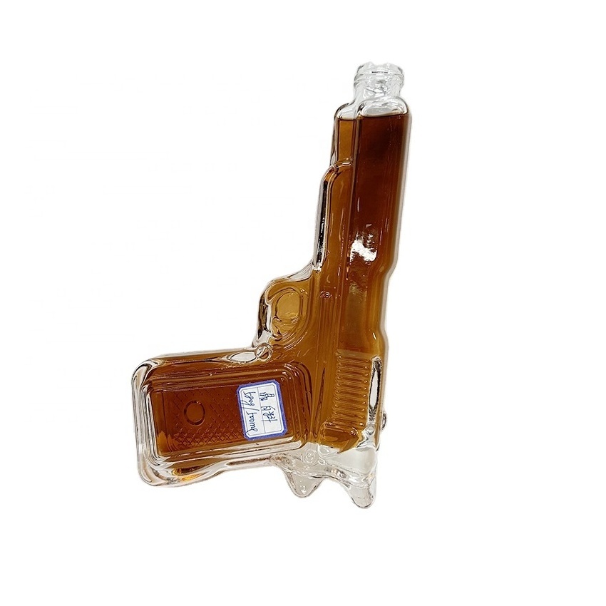 Wholesale Glass Gun Shaped Wine Bottle 500ml 700ml Pistola Wine Beer Bottle Spray Gun