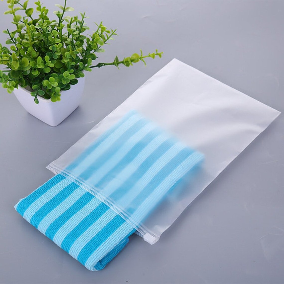 Best Selling Matte/frosted Packaging Zipper lock Plastic Bags,T Shirt Swimwear Zip Lock Clothing Bags with custom logo