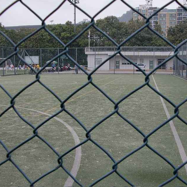 chain link fence barbed wire extension arms