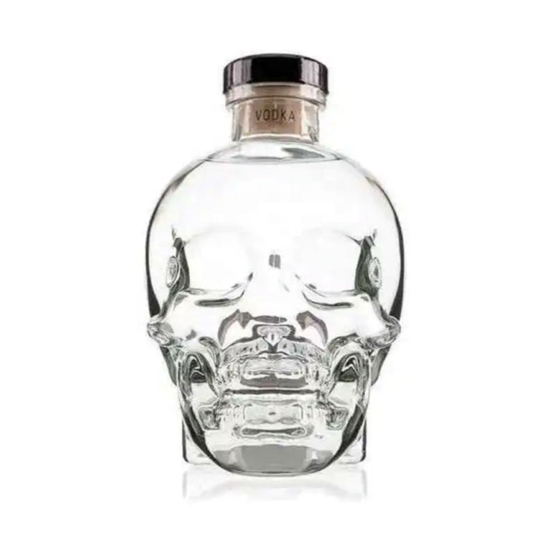 Factory custom design  750ml skull  glass bottle unique shape 750ml brandy vodka  liquor glass bottle with wooden cork