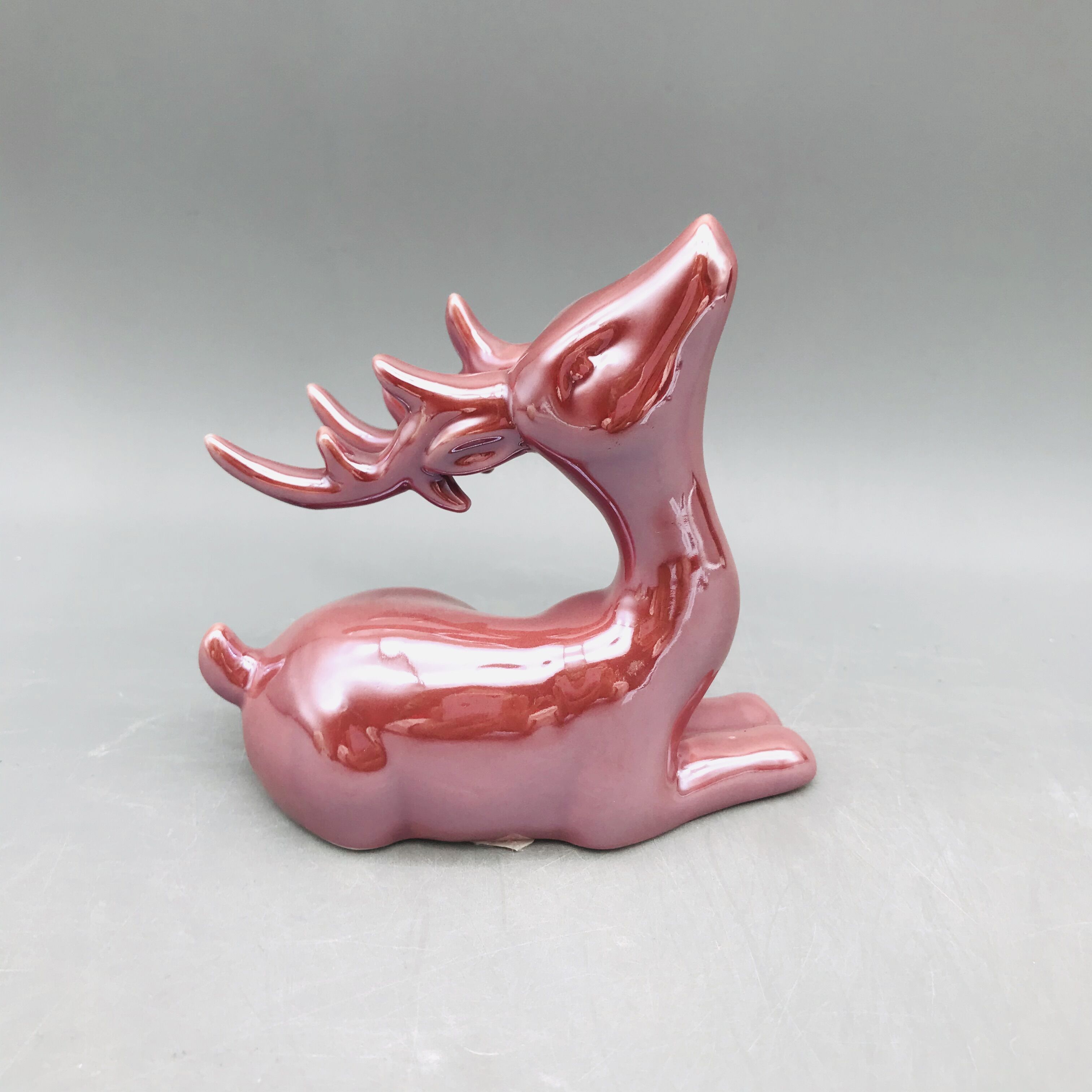 Superior quality plated red ceramic reindeer figurine