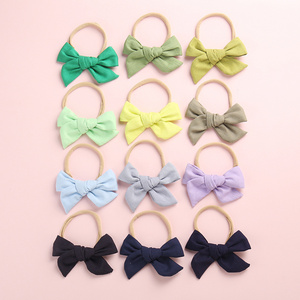 Children's bamboo knot cotton windmill bow hairband baby super soft headband in solid color