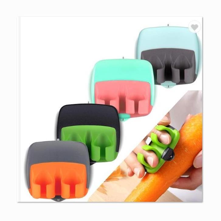 2021 Home Smart Kitchen Gadgets Plastic Stainless Steel Two Finger Apple Fruit Palm Peeler For Potatoes Vegetables