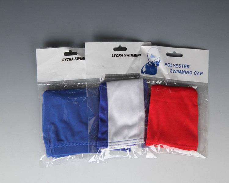 Popular polyester adult swimming caps with shiny surface,lycra swim caps with high elasticity fit both long hair and short hair