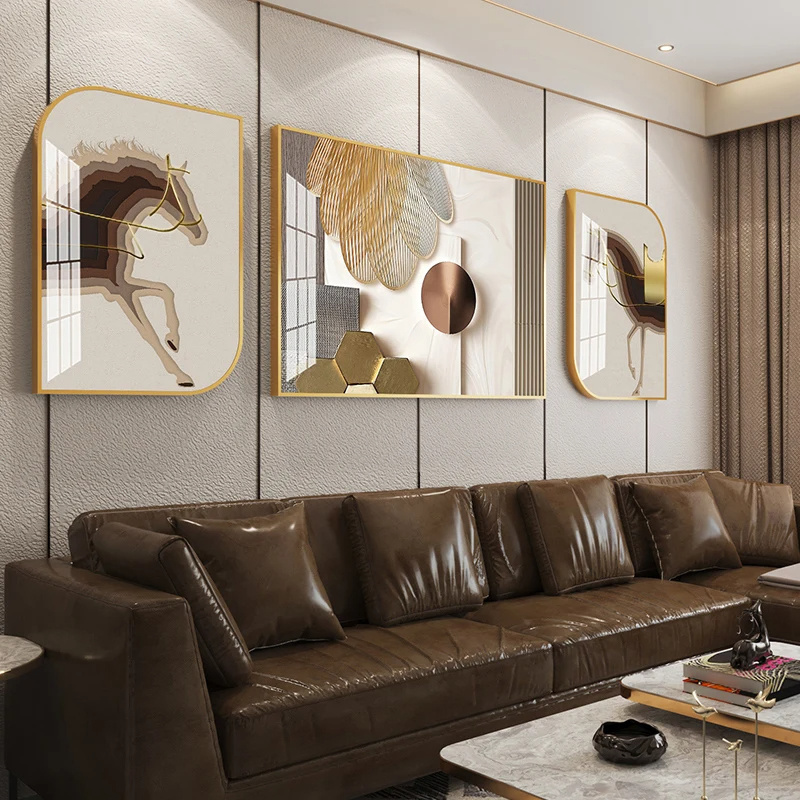 The living room is decorated with a backdrop wall of modern luxury sofa painted in crystal porcelain with a triple metal frame