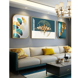 The living room is decorated with a backdrop wall of modern luxury sofa painted in crystal porcelain with a triple metal frame