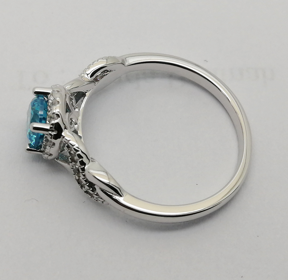 Round Cut Cross Knotted Halo Rings With Sky Blue Topaz Created Crystal In 925 Sterling Silver