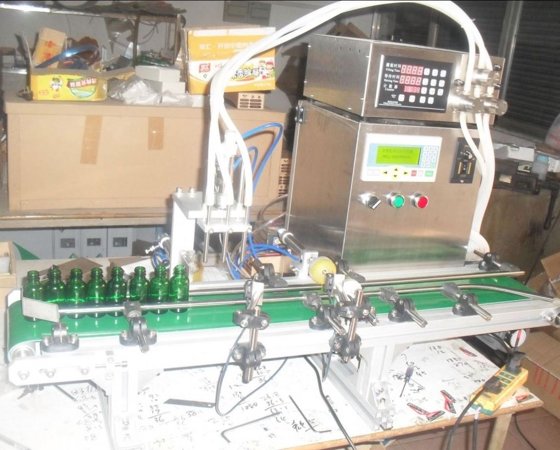 New arrive automatic oil dispensing machine/liquid bottling machine with conveyor