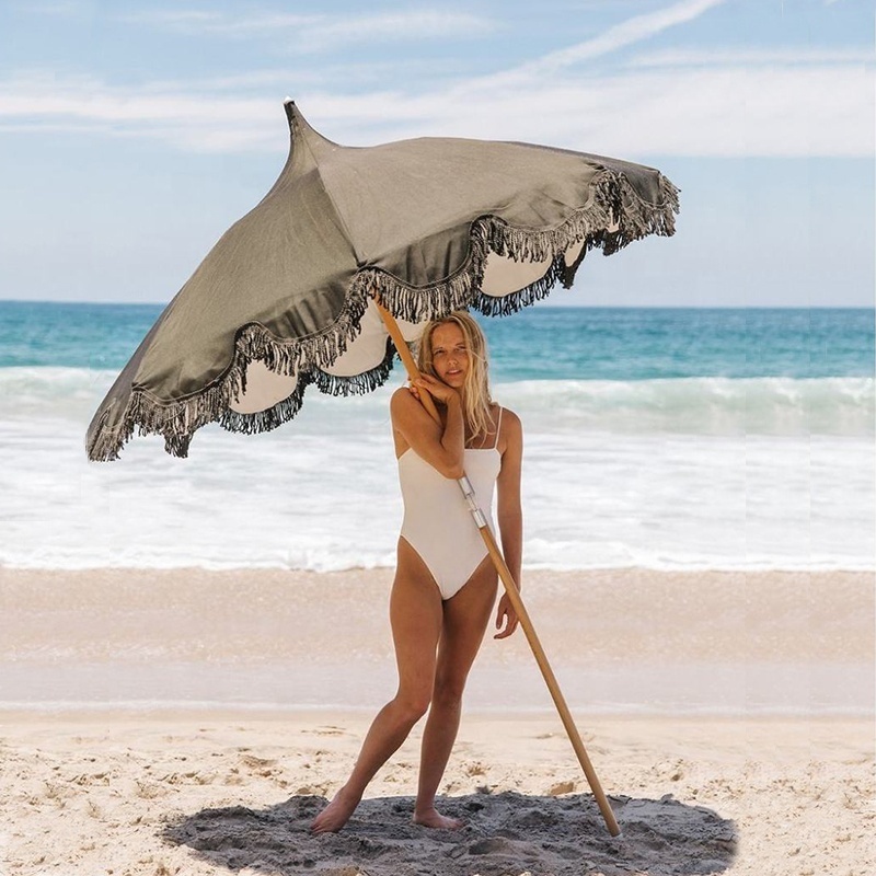 Wholesale Customized Outdoor Sun Market Bali Folding Tilt Black Bali Fringe Beech Wood Pagoda Patio Beach Umbrella With Tassels