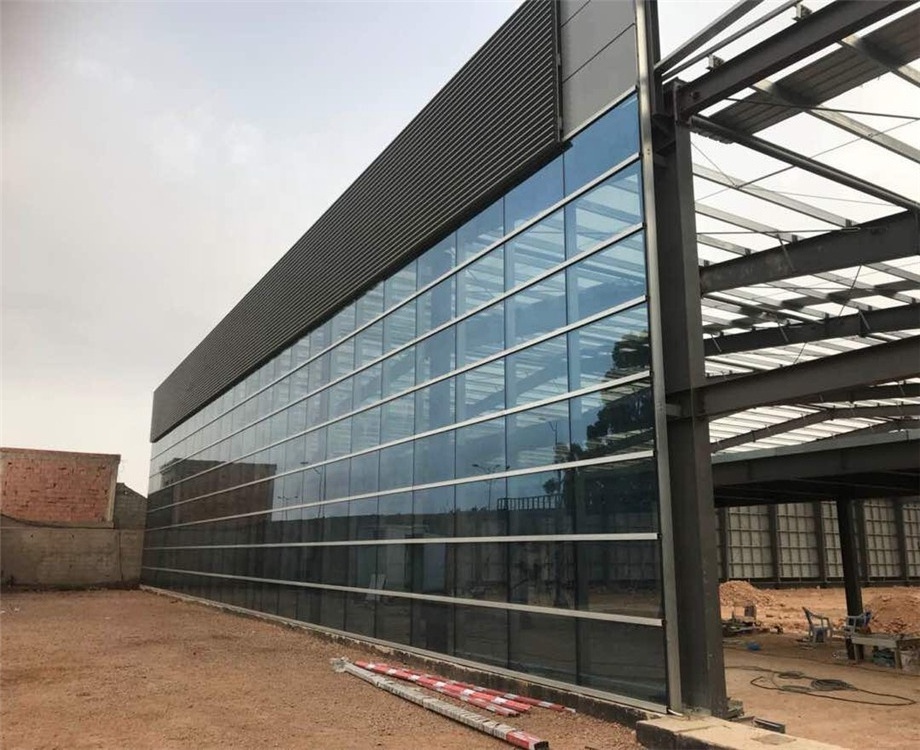 Prefabricated glass curtain wall fast build modern design steel structure office construction small warehouse