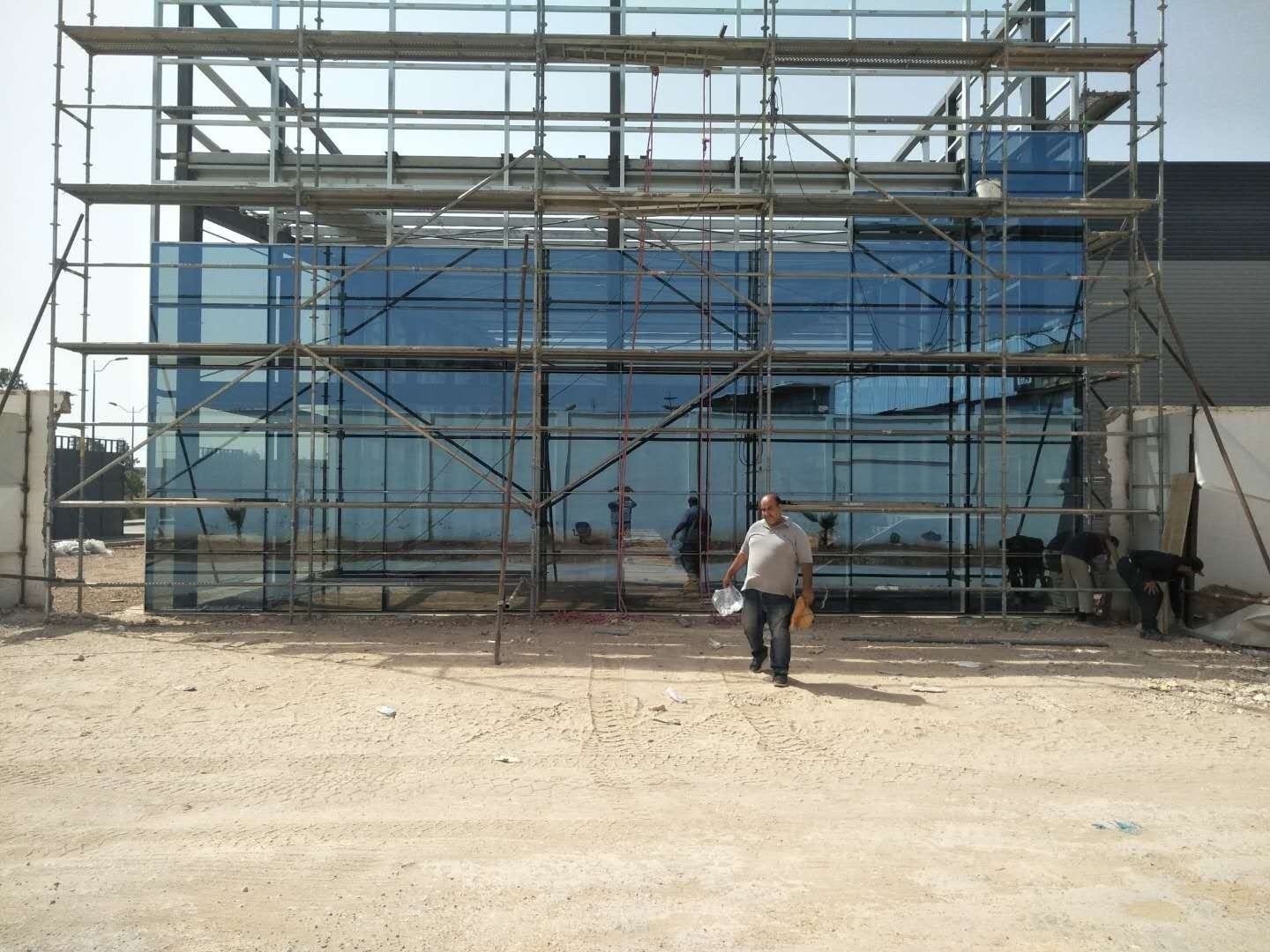 Prefabricated glass curtain wall fast build modern design steel structure office construction small warehouse