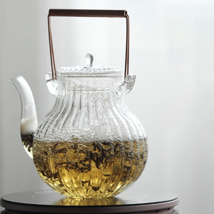 Chinese Teapot Glass Stovetop Kung Fu Teapot Fancy Tea Set Coffee Warmer Heatproof Glass Tea Maker Petal Pattern Glass Teapot