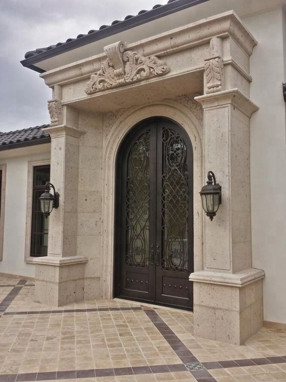 Exterior arched marble stone door surround