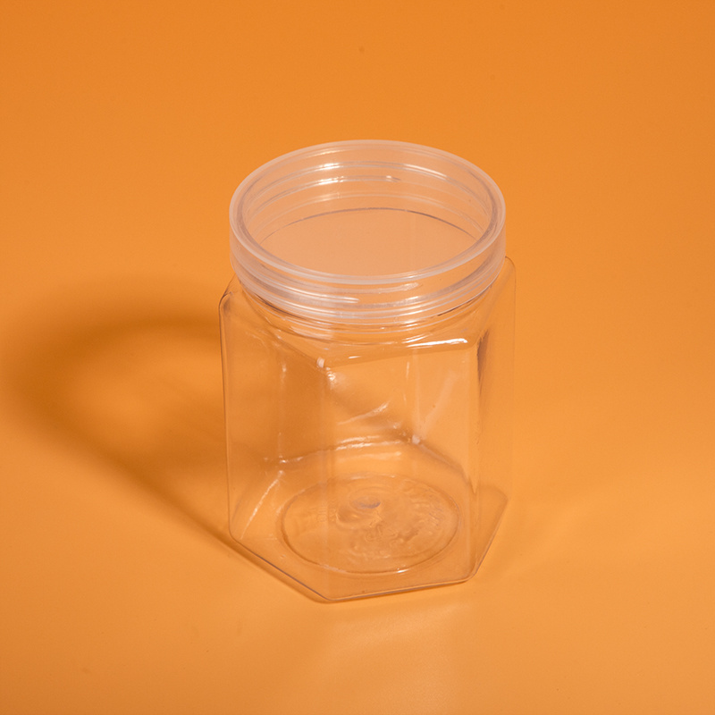 In stock wholesale price available different sizes food grade hexagon shape honey plastic jars