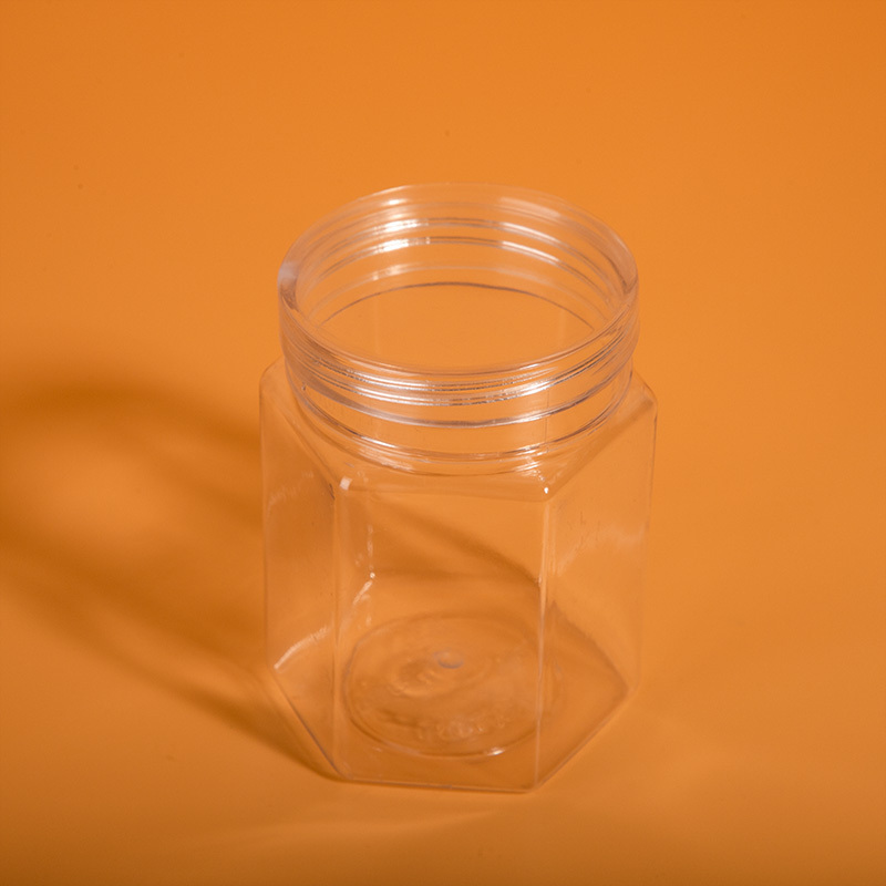 In stock wholesale price available different sizes food grade hexagon shape honey plastic jars