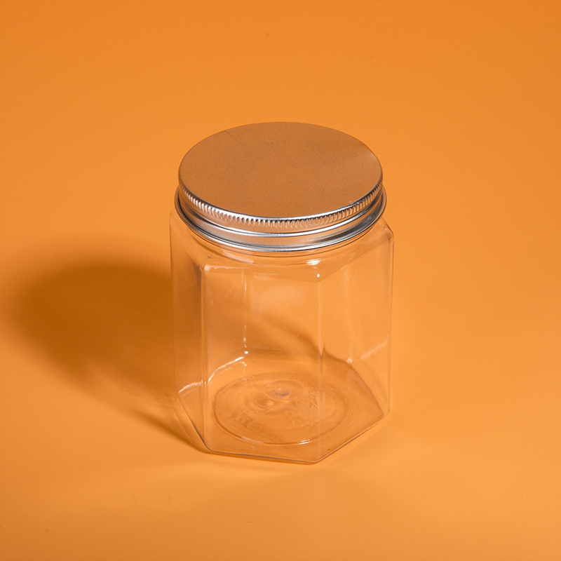 In stock wholesale price available different sizes food grade hexagon shape honey plastic jars