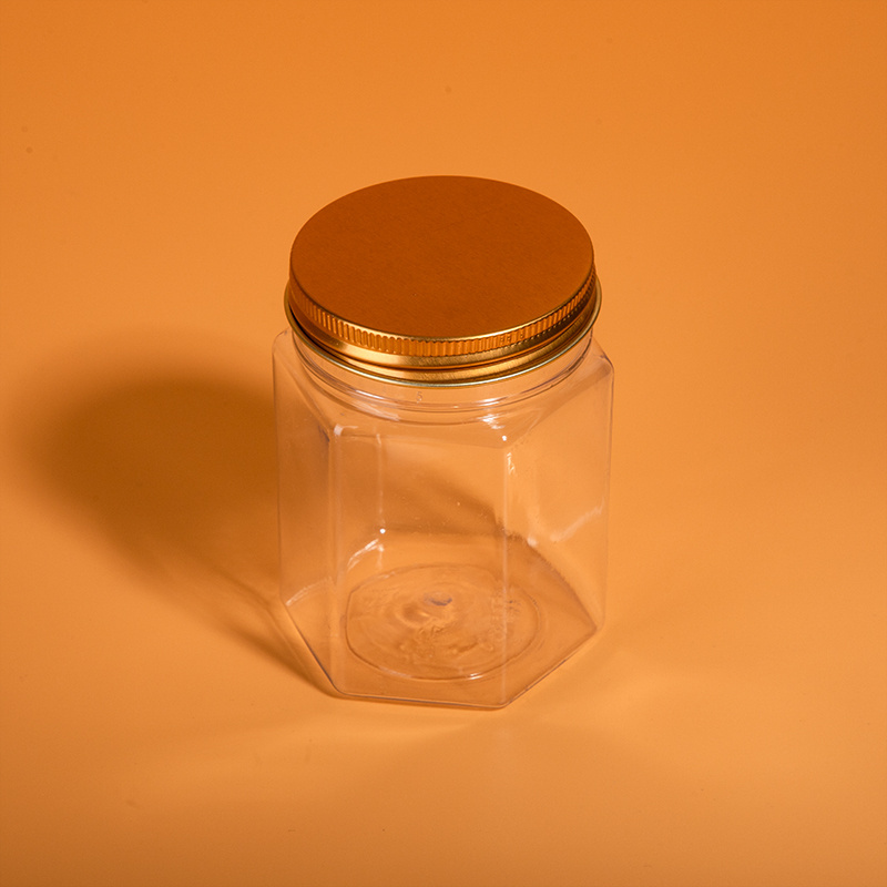 In stock wholesale price available different sizes food grade hexagon shape honey plastic jars