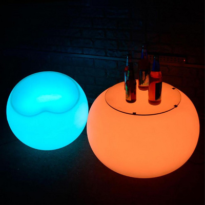 LED plastic glowing colored coffee with led lights bar illuminated outdoor table