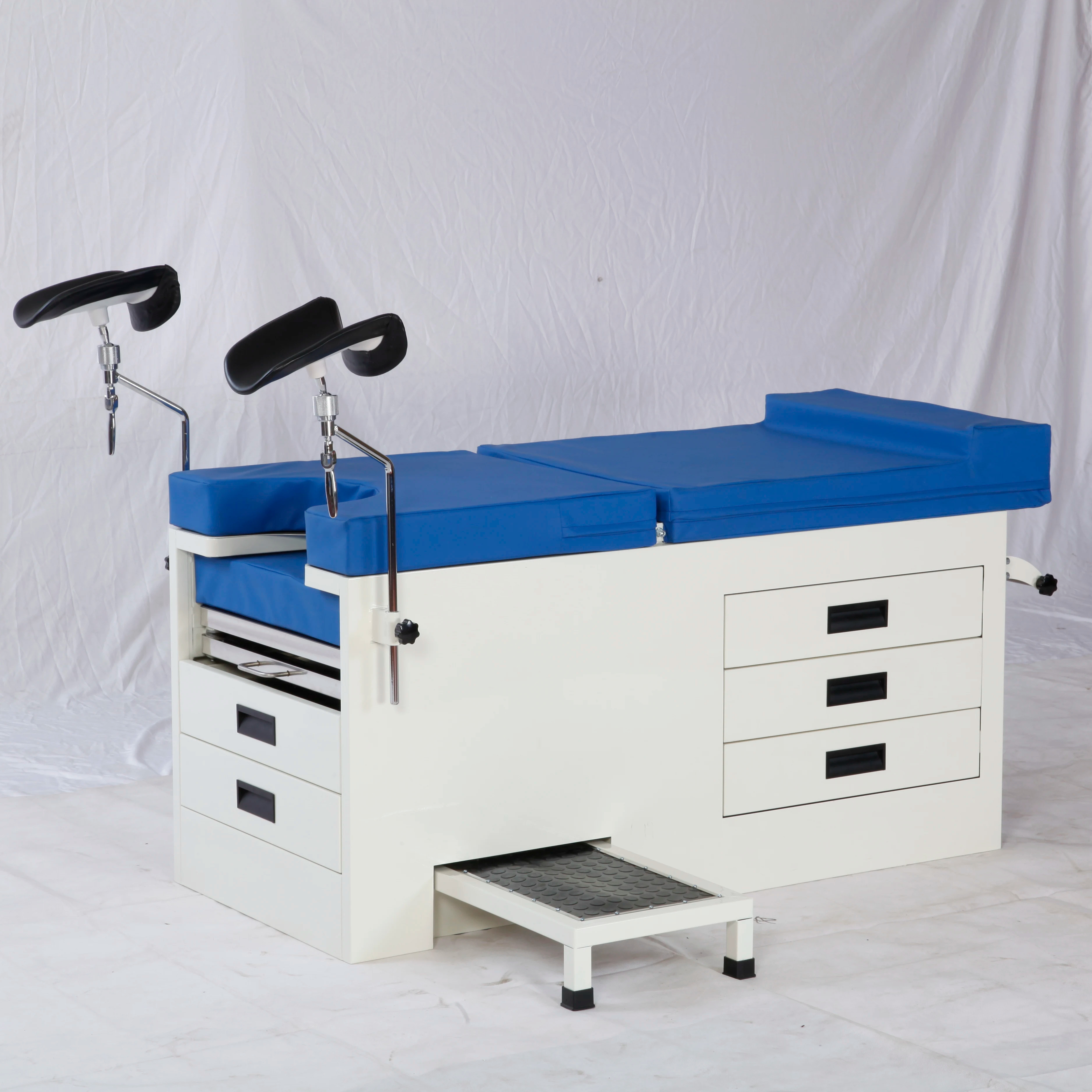 Best-selling instruction of manual Obstetric bed Medical gynaopathy Exam Table with stirrups