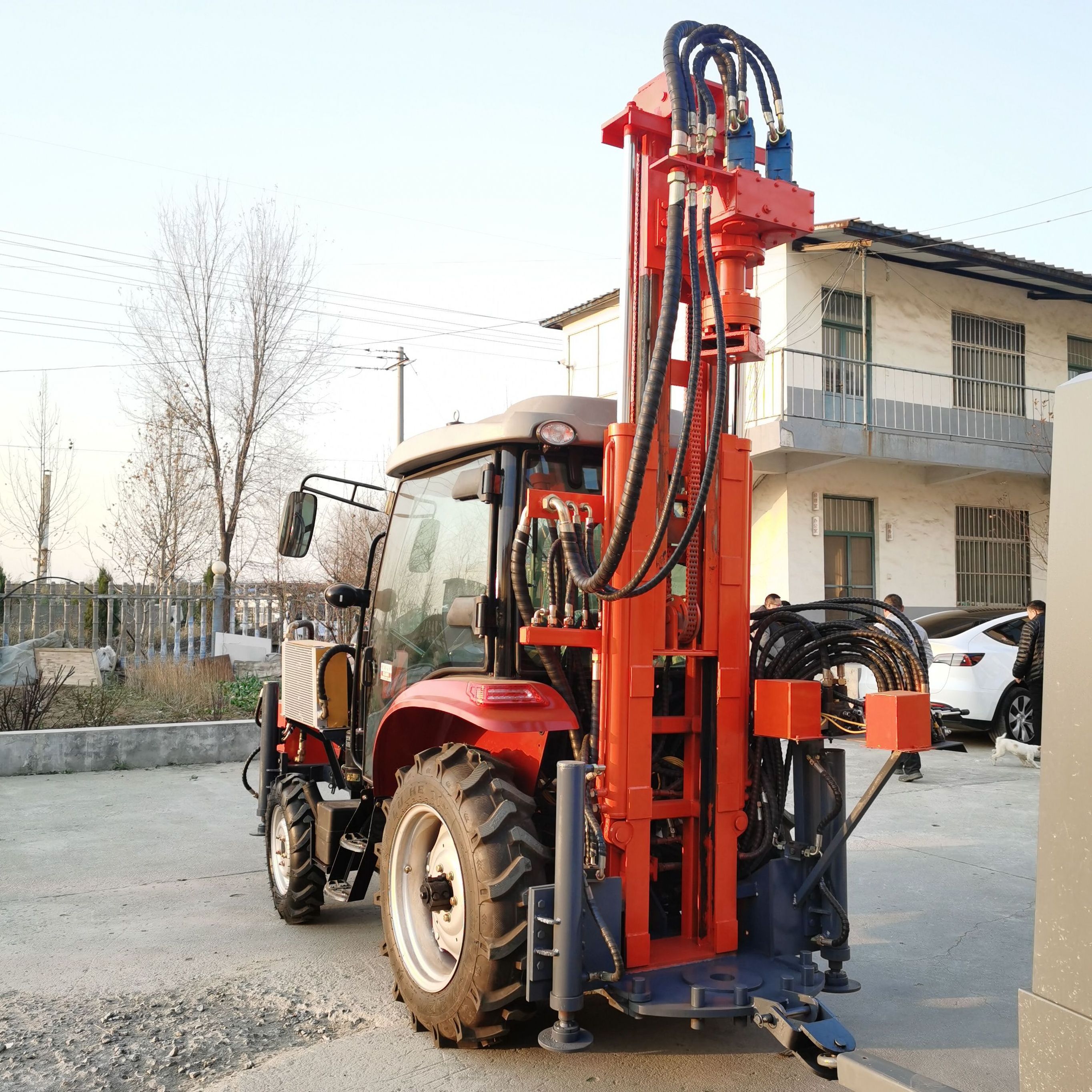 Tractor mounted air DTH water well drilling rig