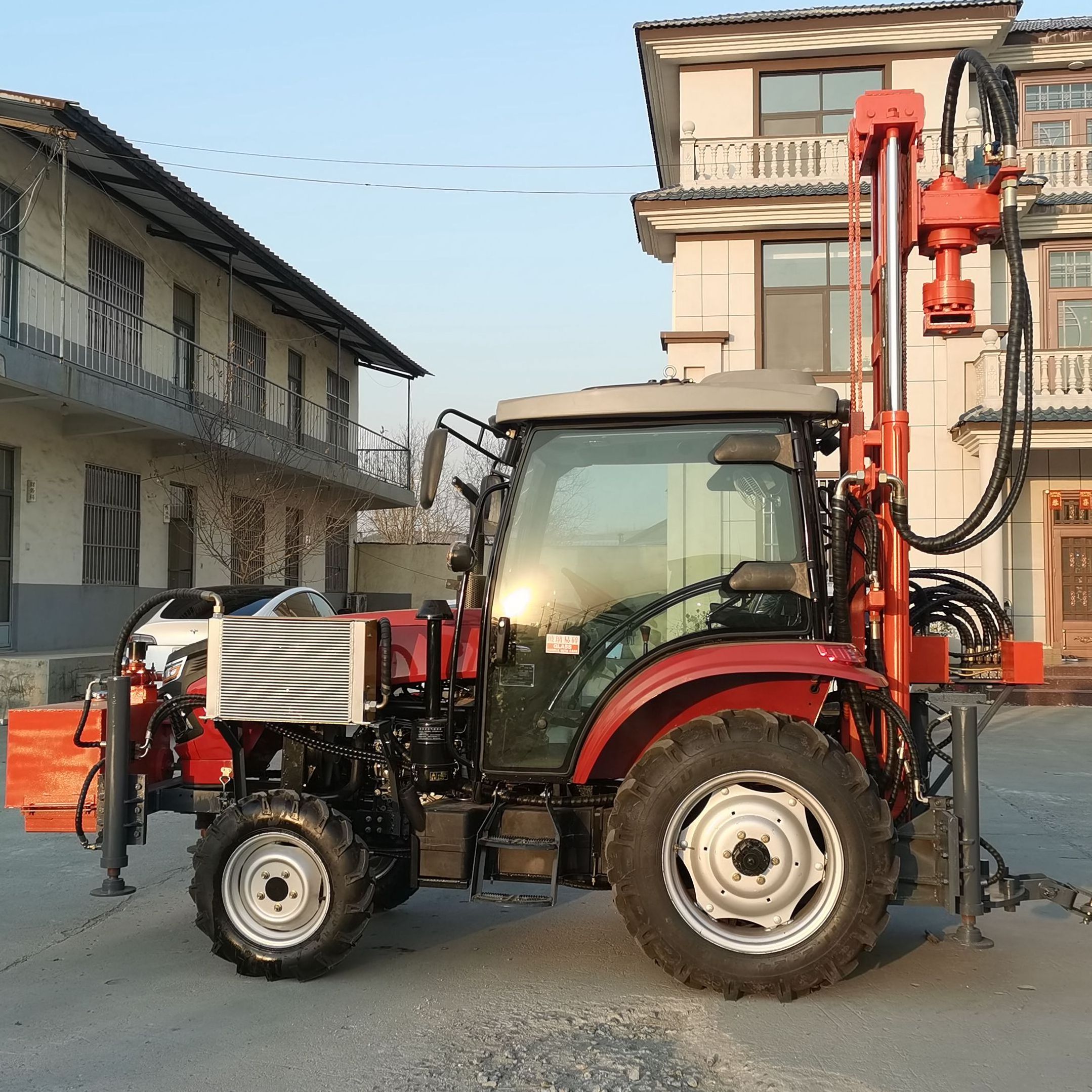 Tractor mounted air DTH water well drilling rig