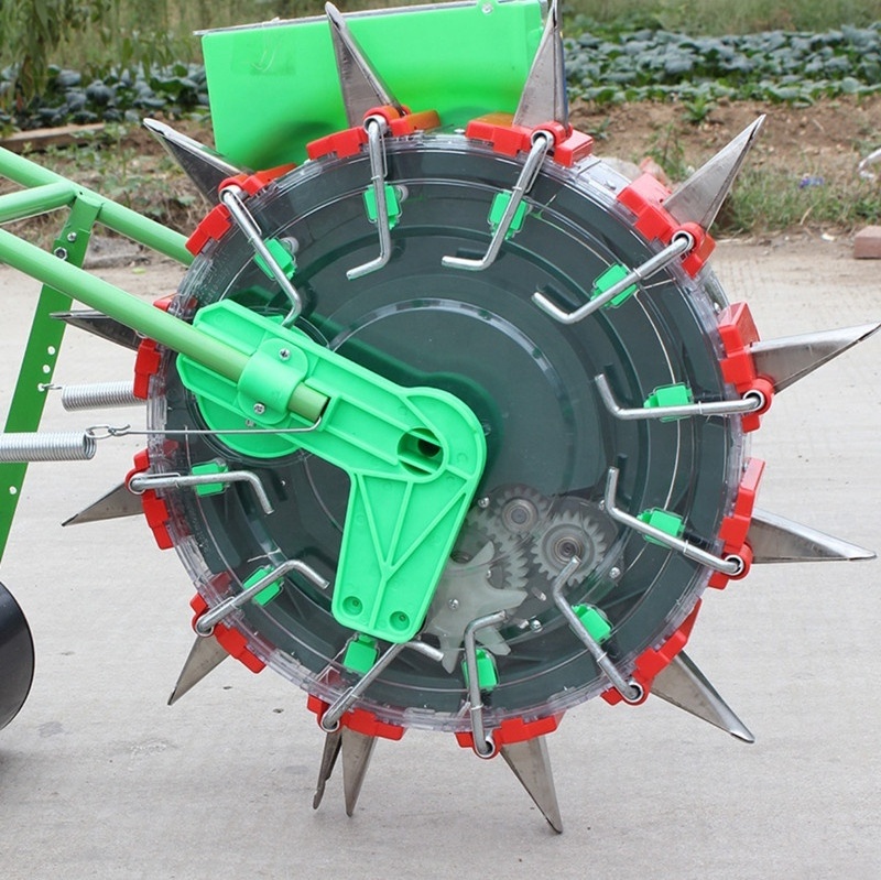 2 in 1 fertilizer planter Hand push corn maize seeder soybean peanut cotton wheat hand push roller seeder fertilization machine