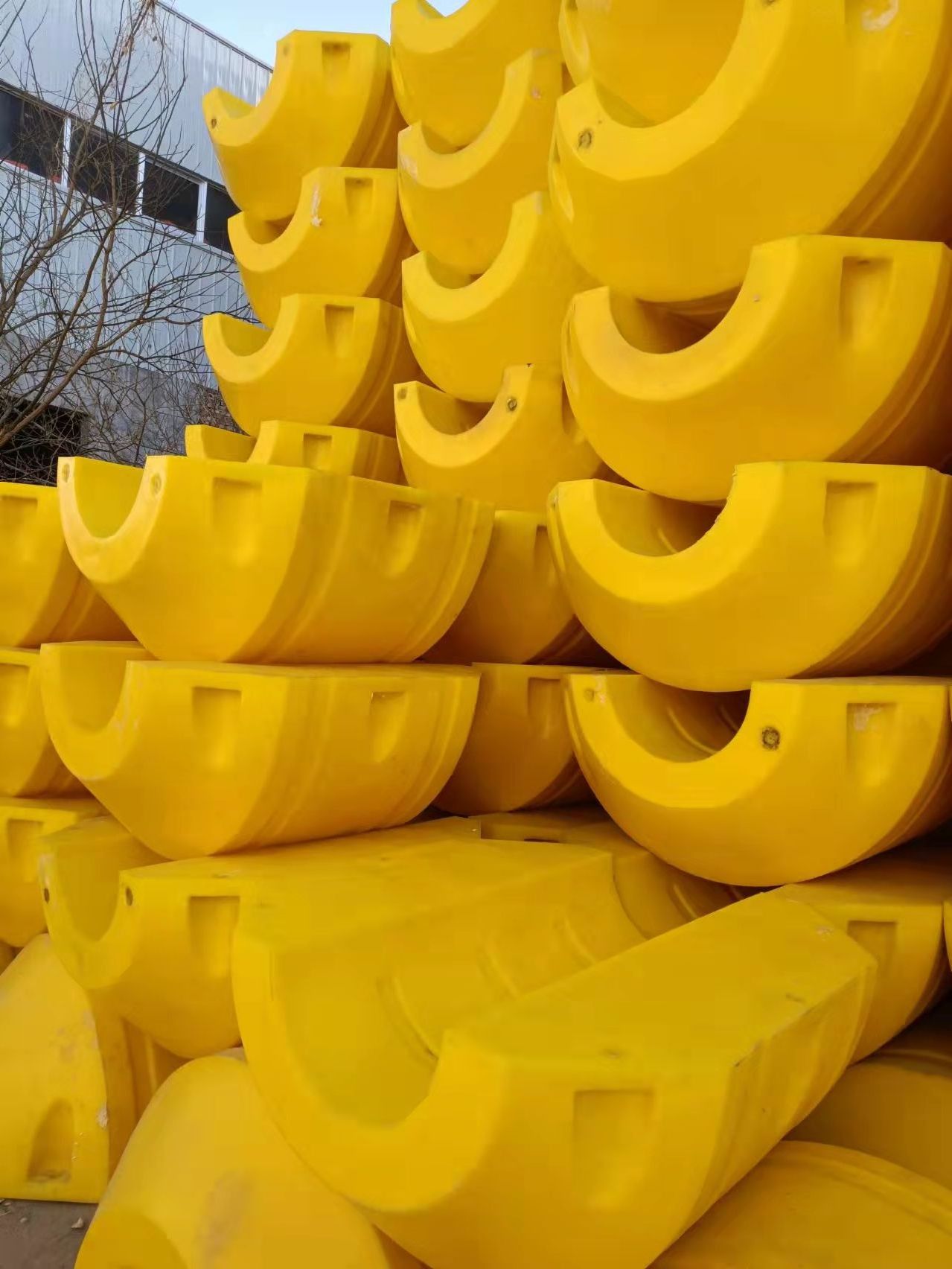 PE (or HDPE) FILLED pipe floats, suitable for dredging pipe withconcave ends and  bold system tongue and groove / locating slots