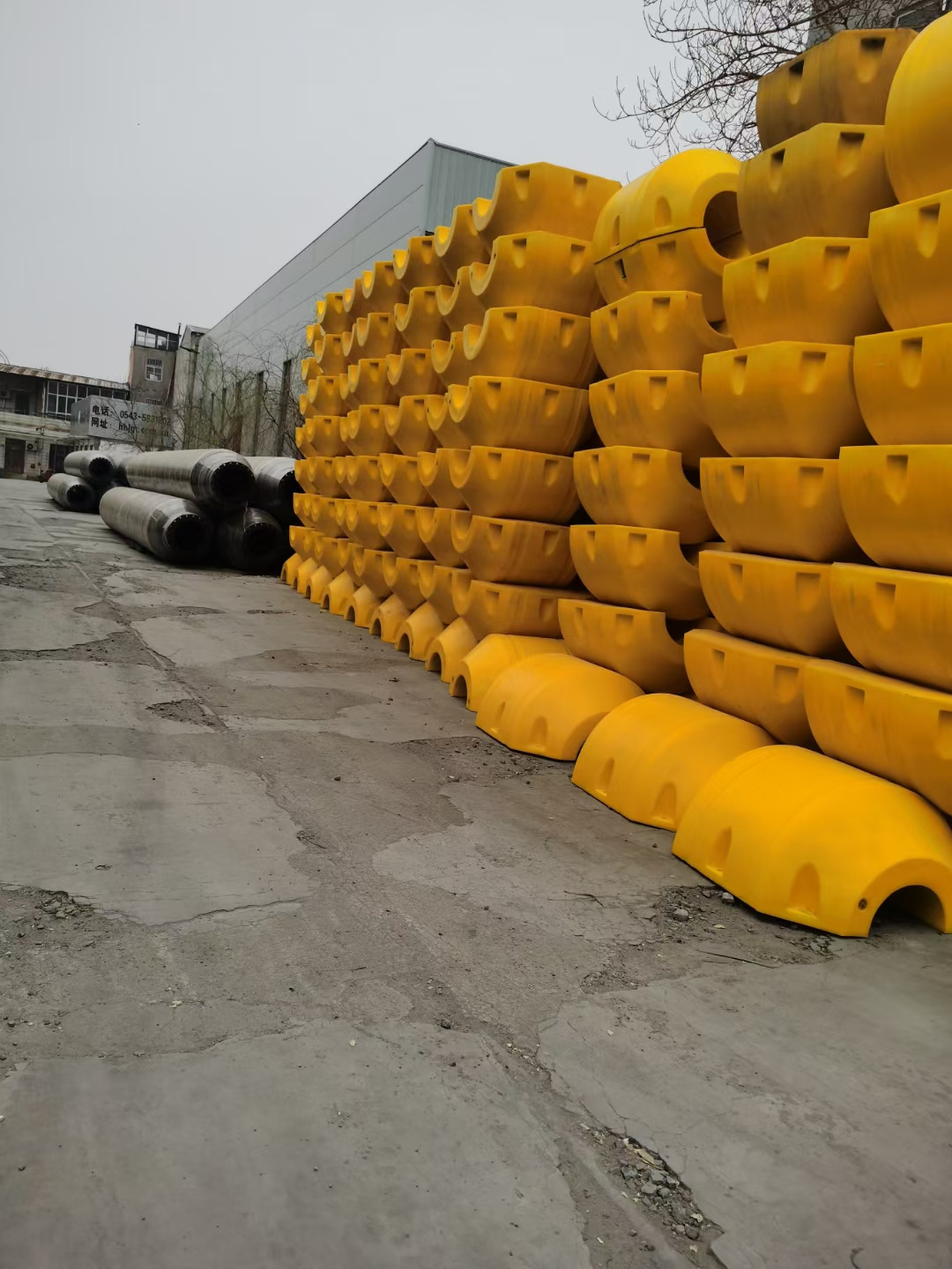 PE (or HDPE) FILLED pipe floats, suitable for dredging pipe withconcave ends and  bold system tongue and groove / locating slots