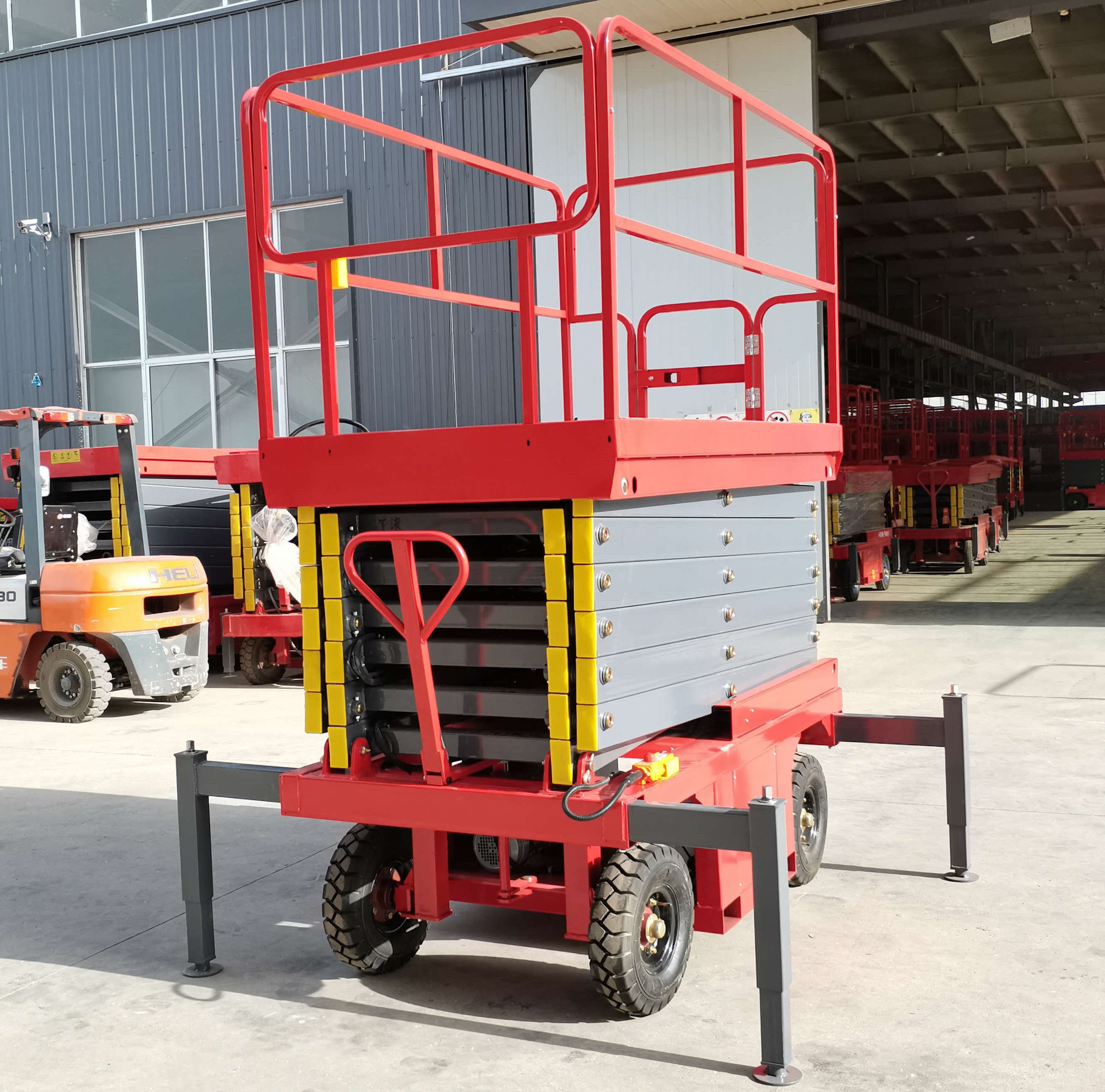 Cheap warehouse movable lift scissors platform electric one man mobile scissor lift