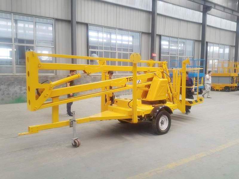 High Quality Manually  Towable Cherry Picker Spider Tractor Crank Arm Boom Lift Table for Sale