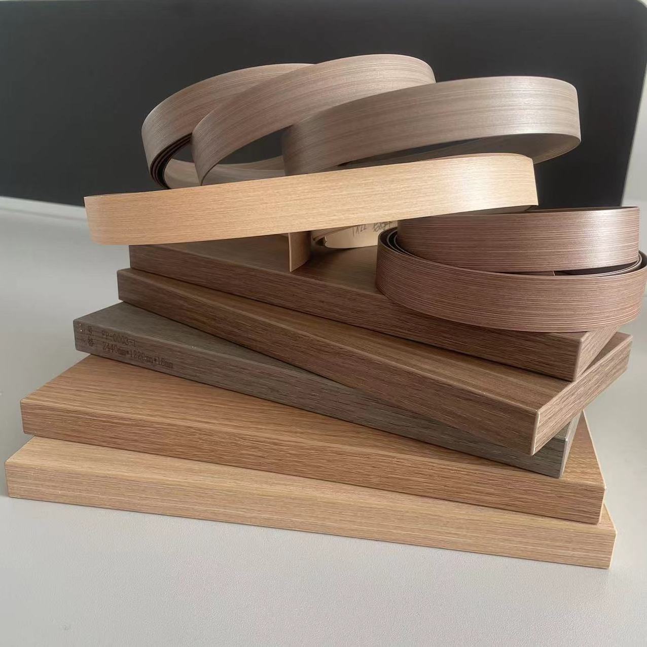 high quality pre-glued bedroom furniture woodgrain and solid color pvc edge banding tape from China