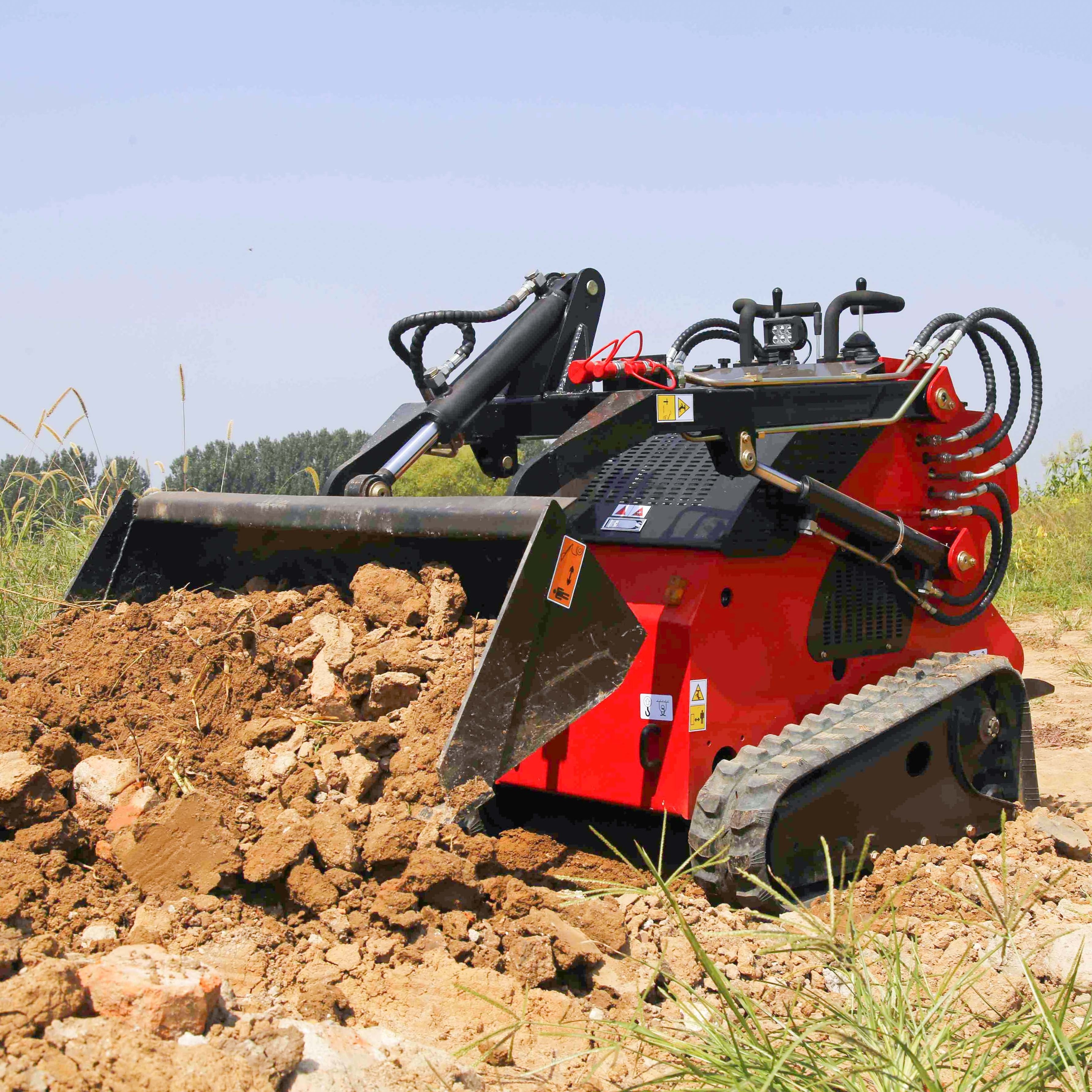 Cheapest EPA EURO5 skid steer bucket Mini Loader stand on skid steer over the tire tracks