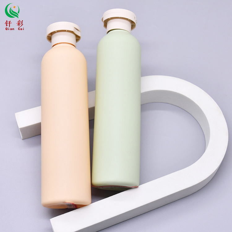 Hot selling plush material 250ml, 300ml round shoulder bottle shampoo plastic packaging empty bottle shower gel bottle body milk