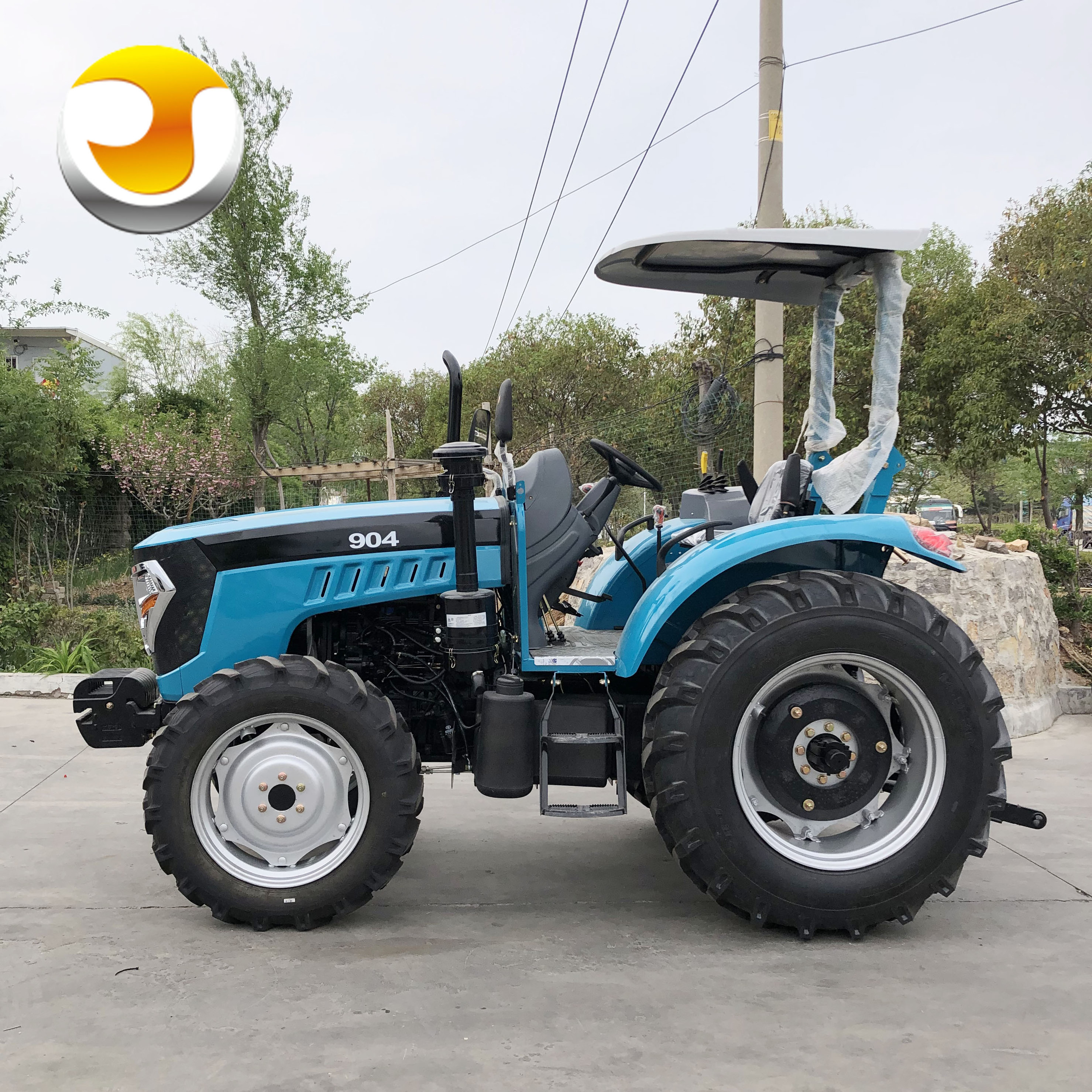 4WD wheel tractor original quality low price farming tractor with canopy 90hp YTO engine