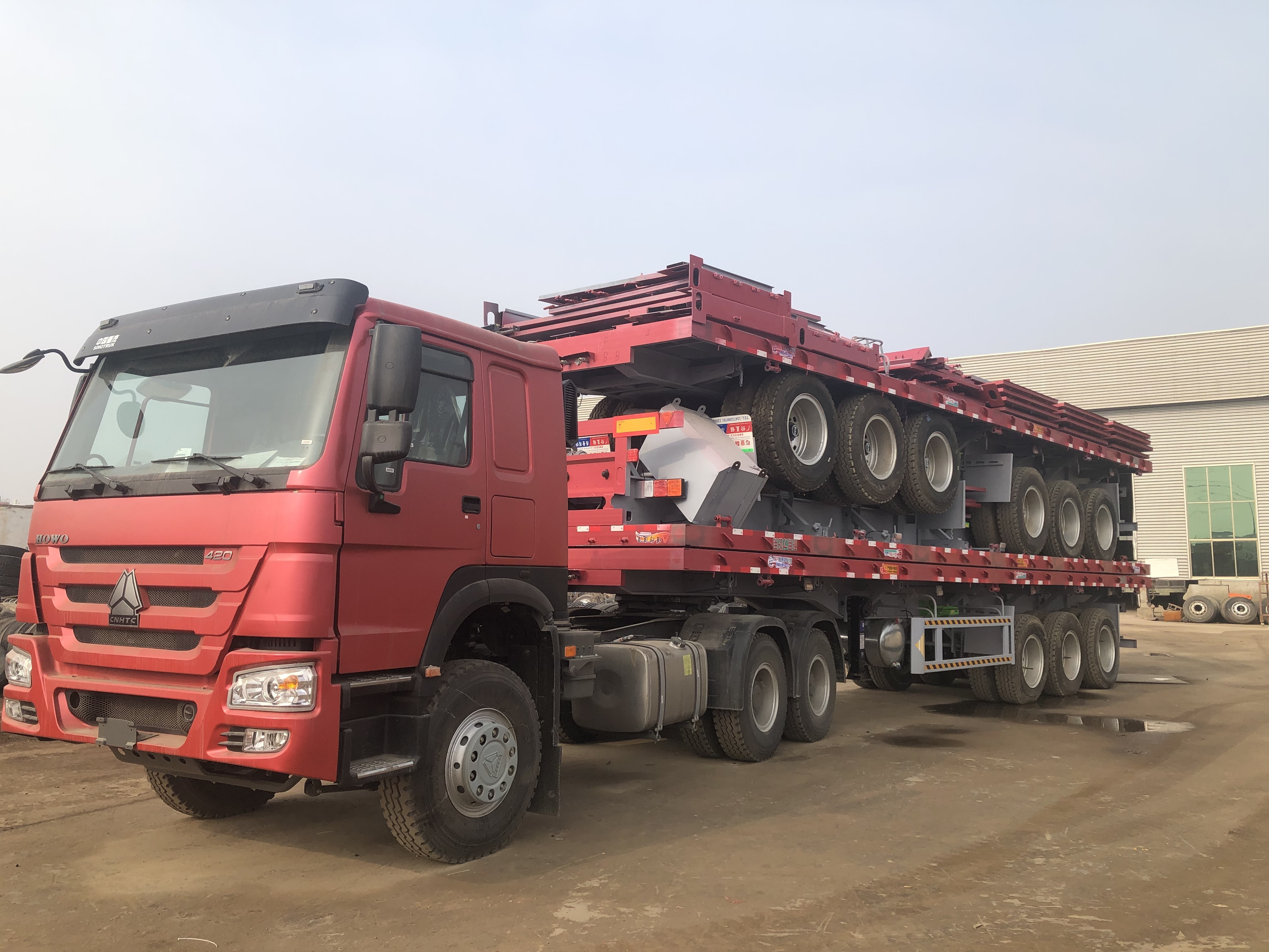 ZW Group 40 ft-60 ft 3 axle Flatbed Semi Trailer container shipping Flat bed Semi-trailer for tanzania