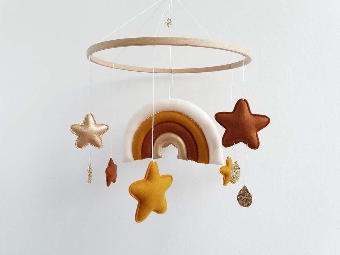 tiny love unique gender neutral bed nursery decor hanging musical felt gold star girl rainbow baby crib mobile