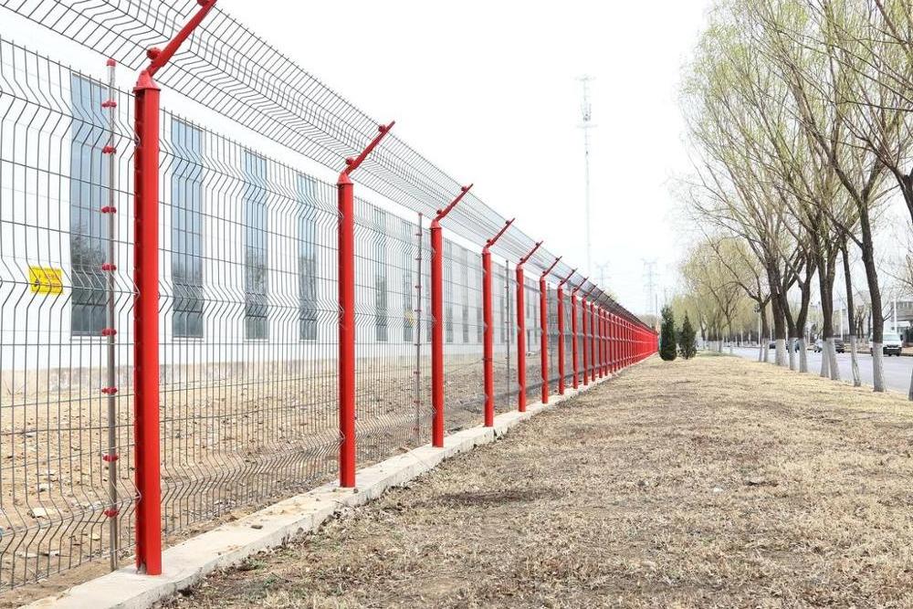 powder coated in black welded wire mesh panel with round post boundaries fencing with barbed wire on top airport fence