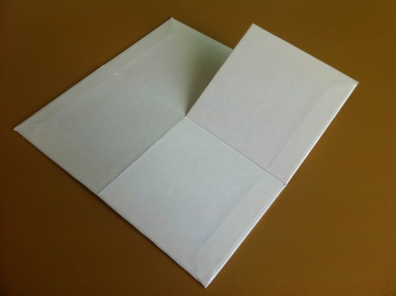 Quad fold paper game board