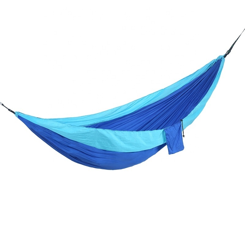 Outdoor equipment includes tree, sleeping parachute  hanging swing chair. hammock hiking backpack