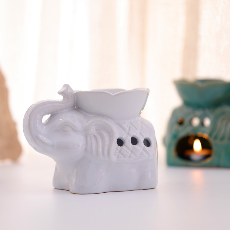 Cute elephant shape cheap wholesale hands wax burner ceramic candle burner oil burner