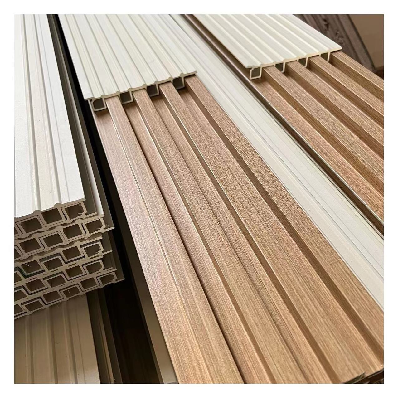 Hot sale waterproof  indoor wpc wooden composite board wainscoting decorativo 3d cladding pvc wpc wall panel