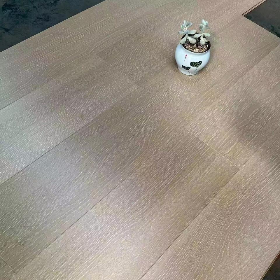 Wholesale Waterproof 7mm 8mm 10mm 12mm parquet herringbone Wood Laminated HDF MDF Floating floor Piso Laminado Laminate Flooring