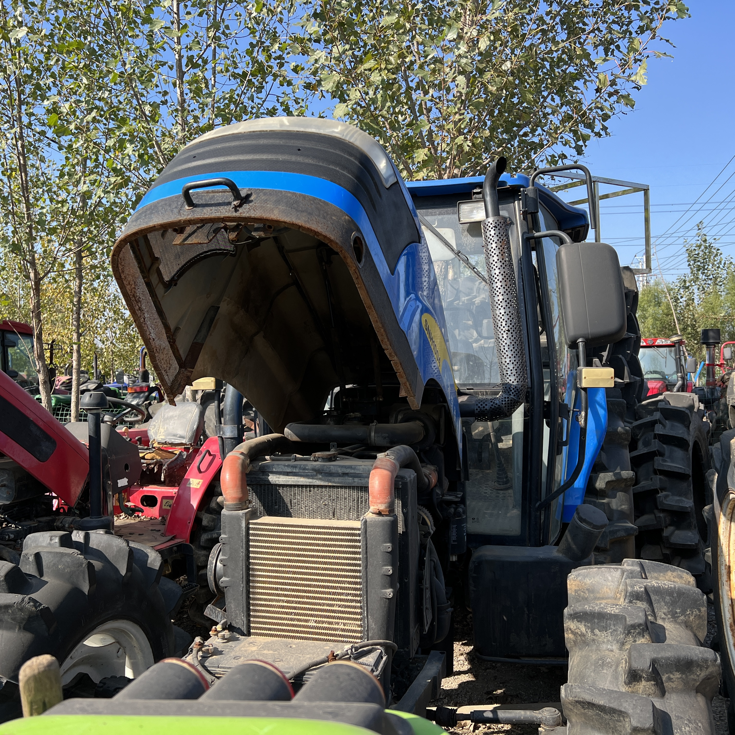 N.EW HOLLAND SNH 1004 Used DEUTZ Engine Used 100hp 4x4 Tractors for Sale in Paraguay Tractor Massey Ferguson 135 New Engine 35KN