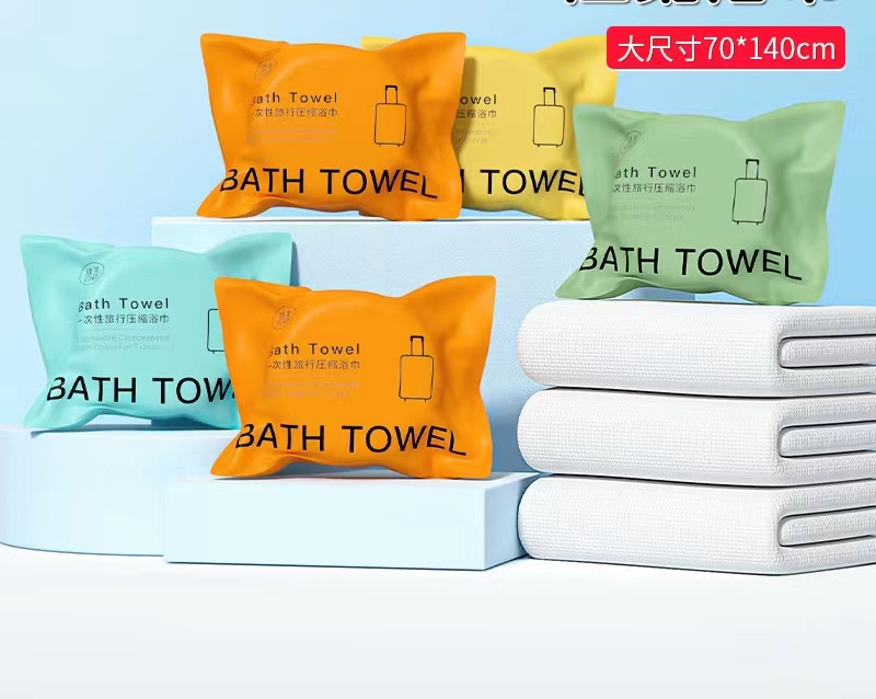 Compressed bath towel thickened and increased disposable portable individually packaged non-woven bath towel 70x140