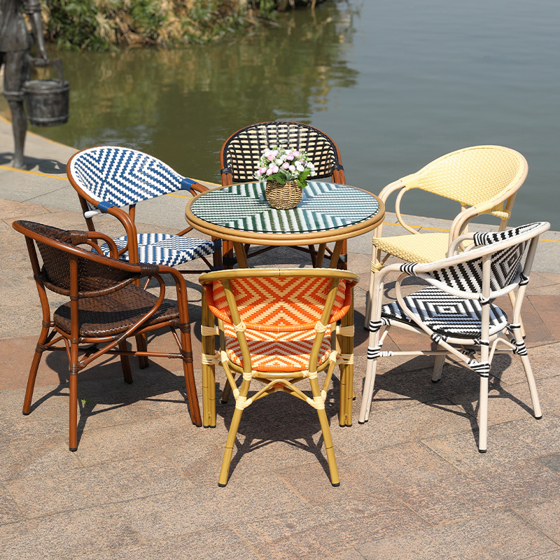 Outside French bistro rattan table and chairs outside patio garden   french restaurant table and chairs