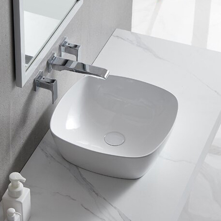 Modern High Quality Ceramic White Table Counter Top Bathroom Sinks Art Design Hand Wash Basin