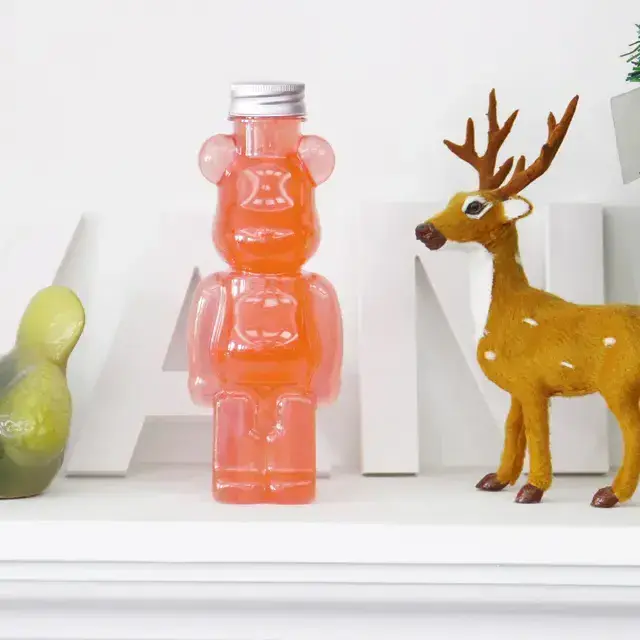 Door to Door Service 350ml 400ml 500ml 700ml Pet Plastic Bear Shape Juice Bottle for drinking with cap and straps