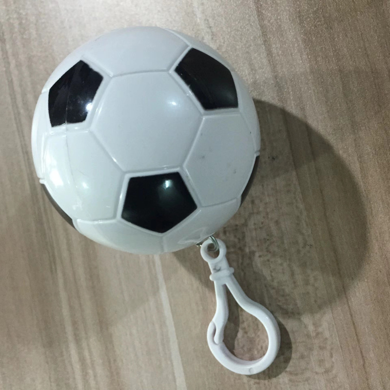 Wholesales portable football disposable raincoat ball key-chain disposable compression raincoat outdoor backpack pendant poncho